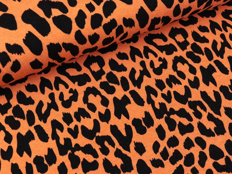Viskosejersey Gepardenflecken schwarz auf Orange