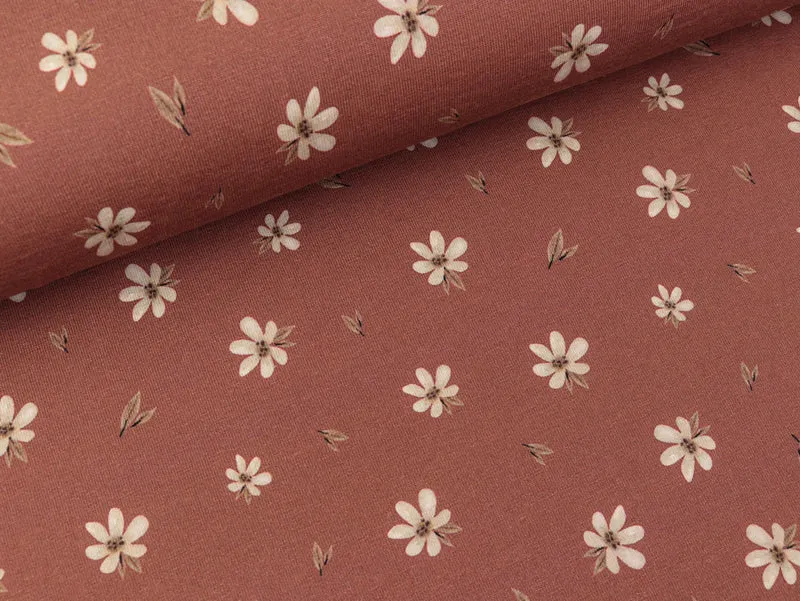 Bio Baumwolljersey Blümchen creme auf Rotbraun
