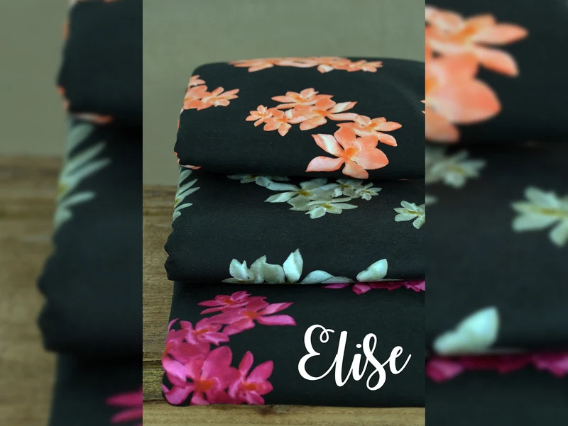 Baumwolljersey Elise Magnolienblüten weiß auf Schwarz by Bienvenido Colorido