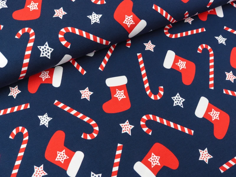 Reststück 13cm - Baumwolljersey Feliz Navidad Nikolausstiefel und Zuckerstangen auf Dunkelblau