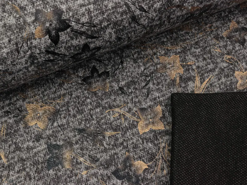 Jersey Folienprint Blumen altgold auf grau meliert