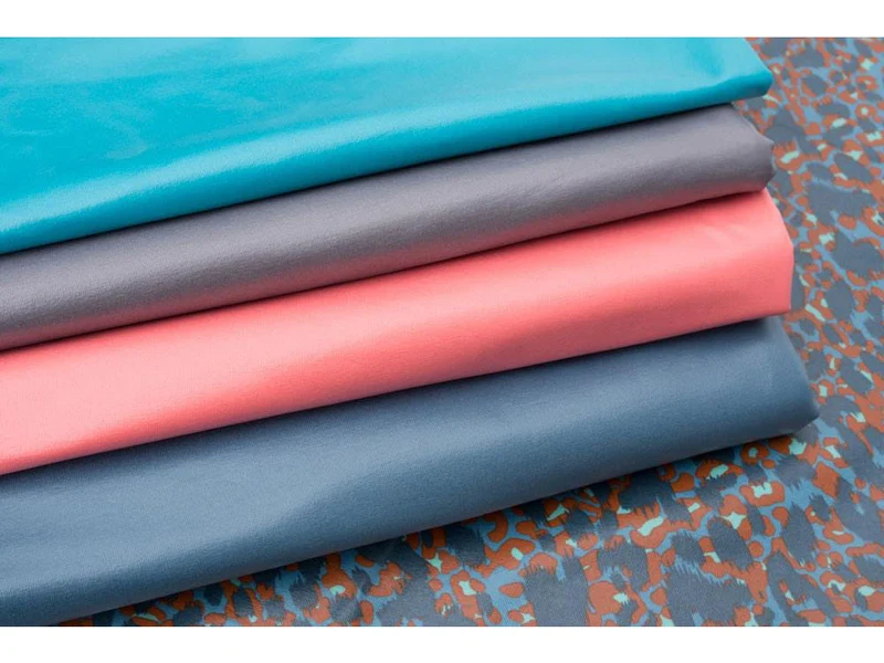 Beschichteter Jersey Reiko Leoprint blau-bunt