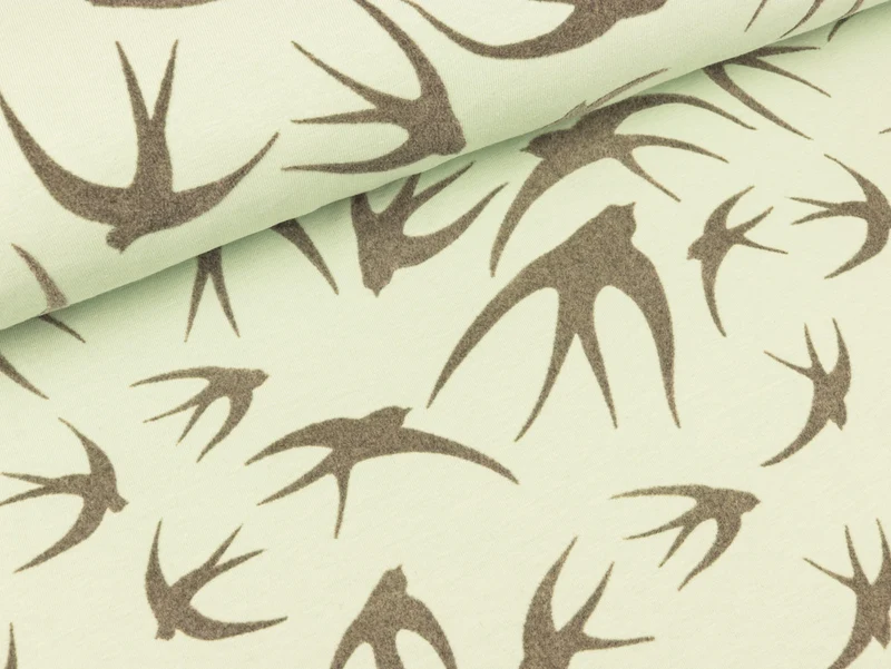 Baumwolljersey Schwalben grau auf Mint Flockprint