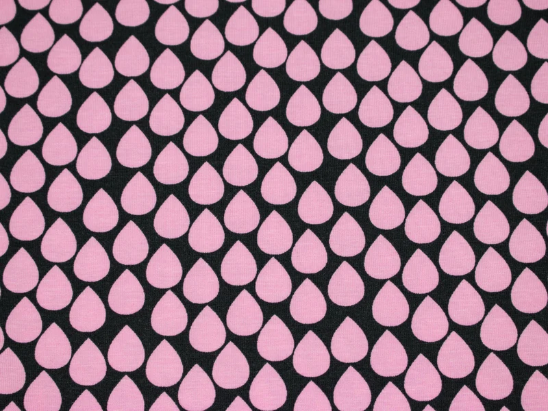 Baumwolljersey Tropfen rosa auf Schwarz
