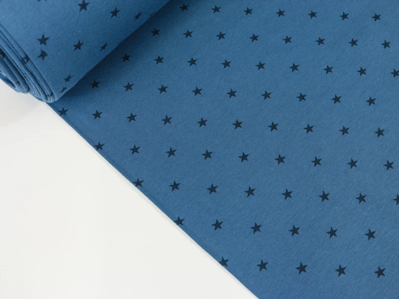 Glatte Bündchenware jeansblau mit Sternen