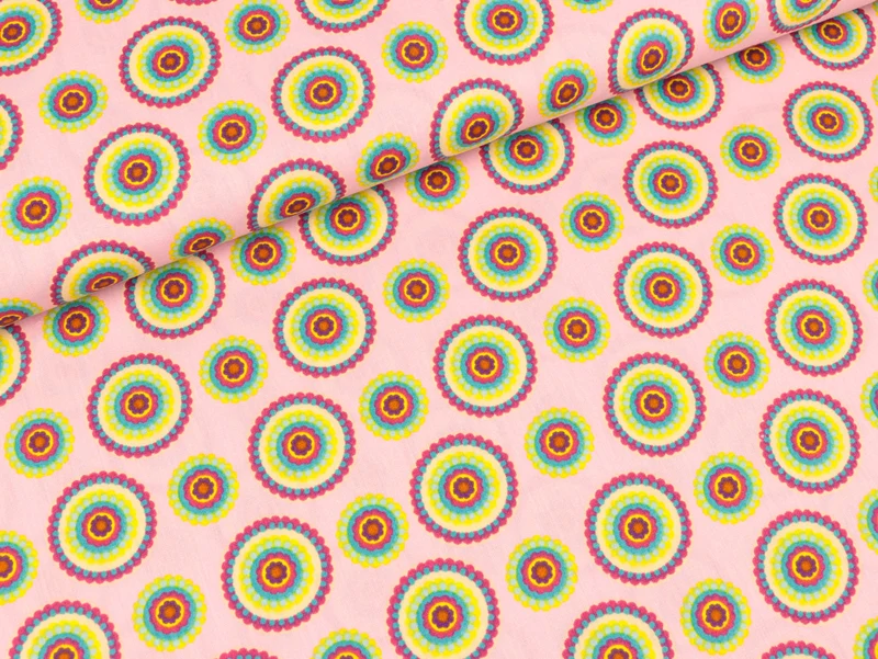 Baumwollstoff Bunte Kreise auf Hellrosa