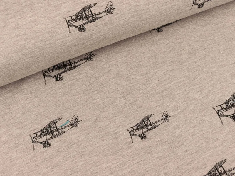 Reststück 105cm - Baumwollsweat Flugzeuge schwarz auf sand meliert