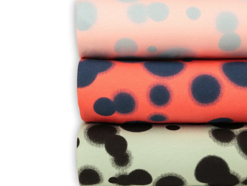 Reststück 32cm - Baumwolljersey Blur Print Dots koralle