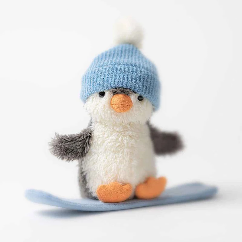 Plüsch-Pinguin auf Snowboard 12 cm