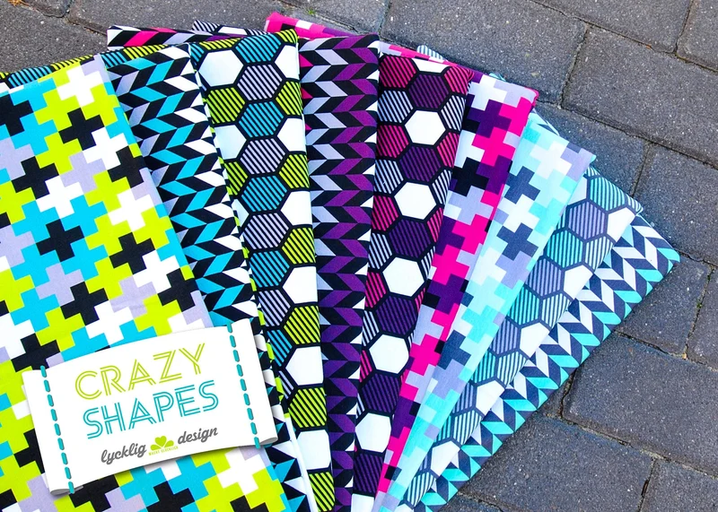 Reststück 39cm - Baumwollsweat Crazy Shapes Pluszeichen grau-mint by Lycklig Design