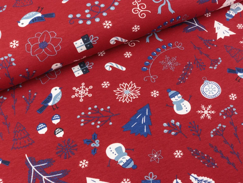 Reststück 5cm - Baumwolljersey XMAS Print Weihnachtliche Winterwelt bunt auf Weihnachtsrot