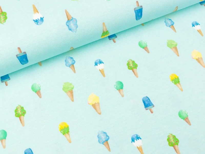 Reststück 13cm - Baumwolljersey Tommy Ice cream bunt auf Wasserblau